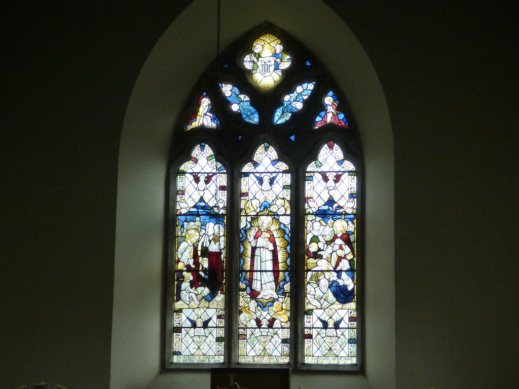 Professional window frame and glass work showcasing window replacement craftsmanship